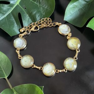 Bracelet doré 6 ronds artistique Œil de Serpent – Bijou unique